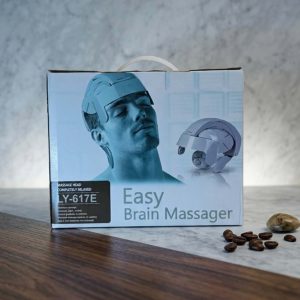 The Insaaf Easy Brain Massager LY-617E packaging and coffee beans on table⁠